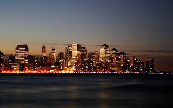 New York City skyline at dusk over the water