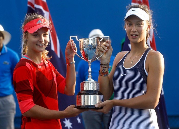 Anna Kalinskaya and Tereza Mihalikova holding a trophy