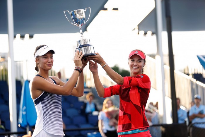 Anna Kalinskaya and Tereza Mihalikova holding a trophy