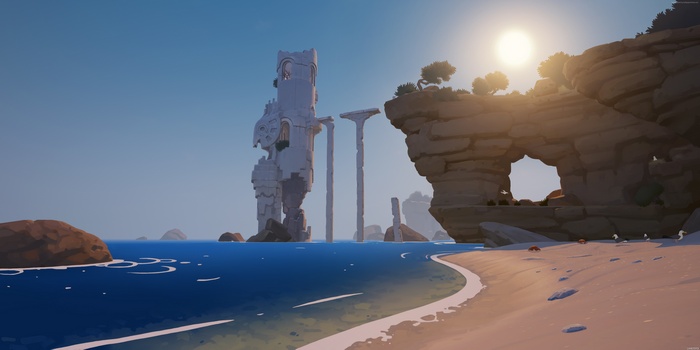 Ancient ruins on a beach with the sun setting