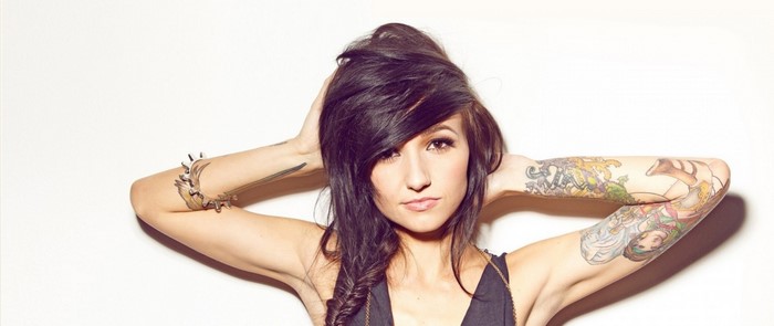 Valerie Poxleitner with tattoos and black hair