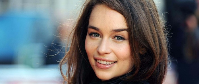 Emilia Clarke portrait with brown hair and blue eyes
