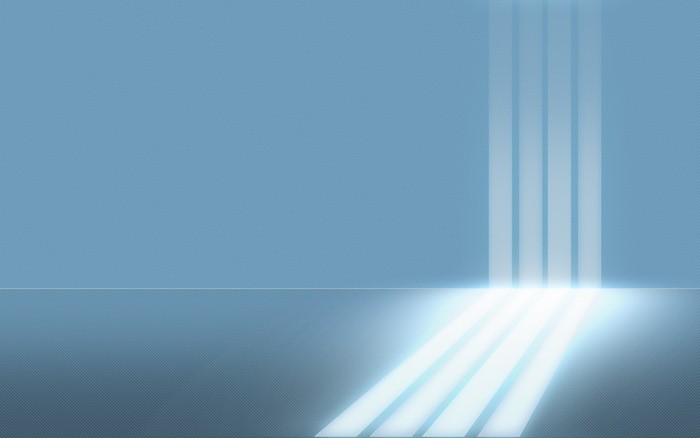Abstract blue light beams on textured surface