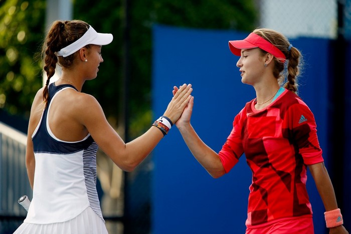 Anna Kalinskaya and Tereza Mihalikova high-fiving