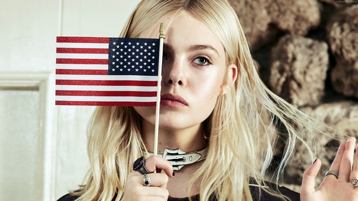 Elle Fanning holding American flag
