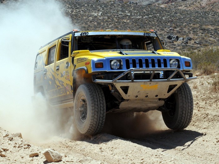 Yellow Hummer H1 off-road racing vehicle