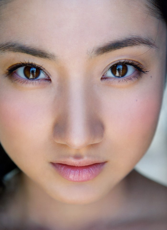 Close-up Portrait of Asian Woman with Brown Eyes