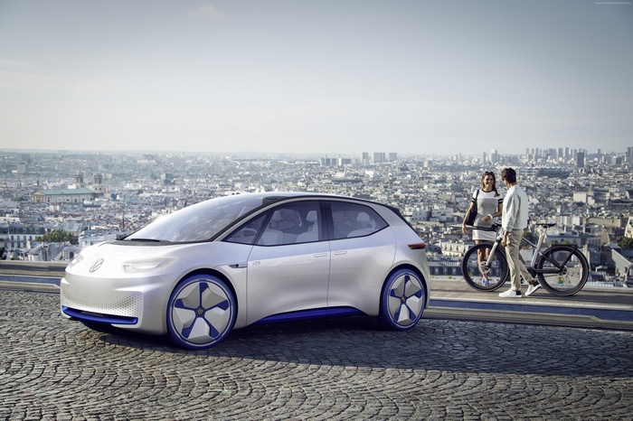 Volkswagen I.D. concept car with couple and bicycles in Paris