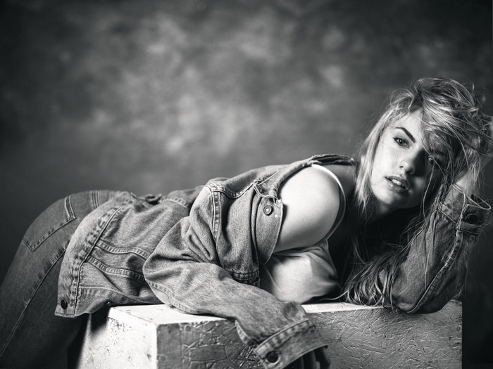 Monochrome portrait of a woman in denim