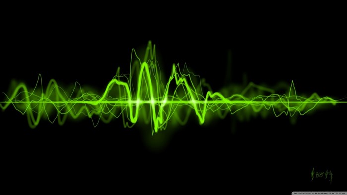 Green sound wave on black background