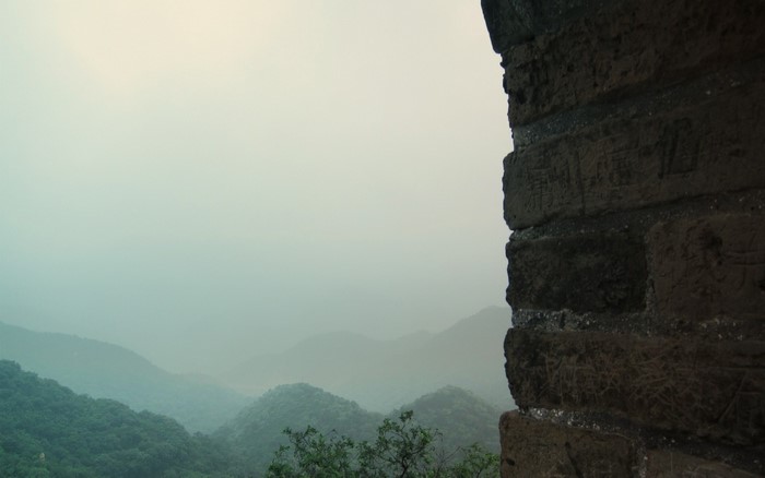 Great Wall of China landscape with misty mountains