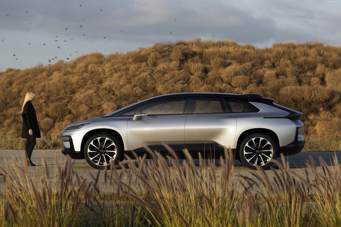 Faraday Future FF91 electric car with woman