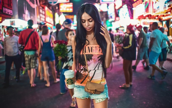 Woman with Starbucks in Times Square