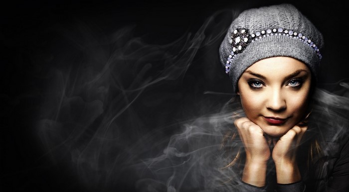 Natalie Dormer portrait with smoke and beaded cap