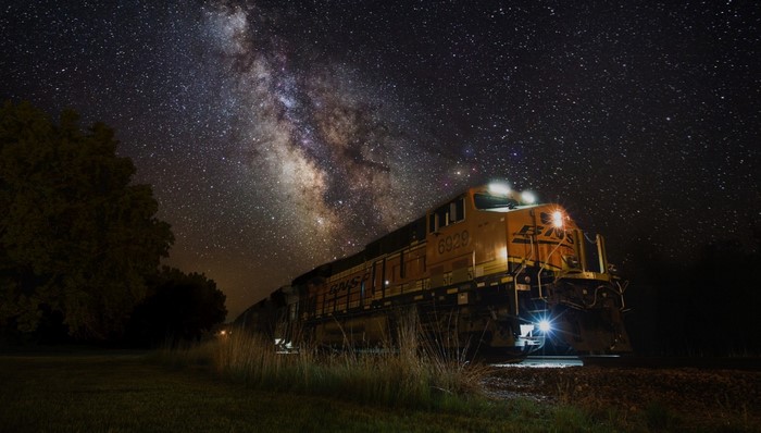 Train under the Milky Way in South Dakota