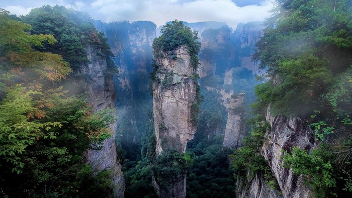 Misty mountains and rock formations in Zhangjiajie National Forest Park