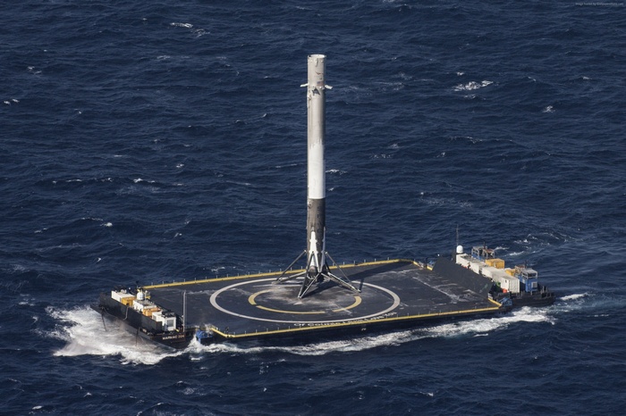 SpaceX rocket booster lands on a drone ship at sea