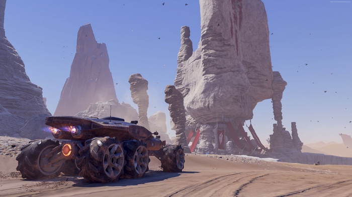 Mass Effect: Andromeda rover in a rocky desert landscape