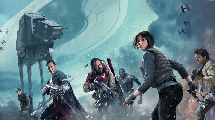 Rogue One: A Star Wars Story characters with AT-AT and TIE fighters