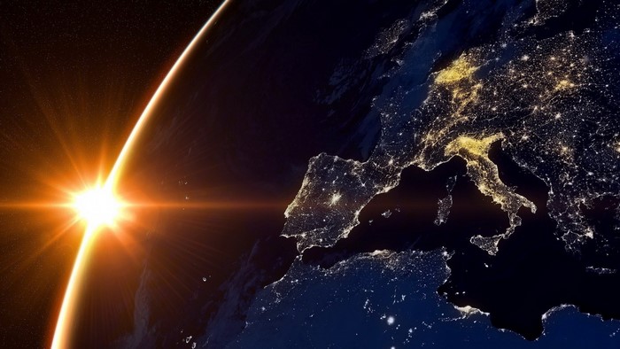 Sunrise over Earth at night, Europe illuminated