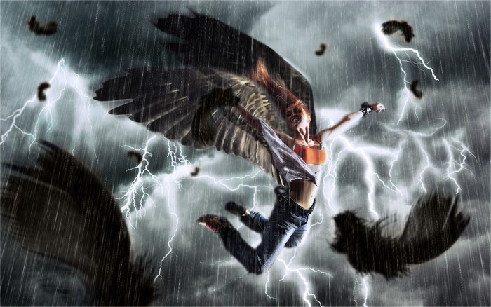 Woman with angel wings in a thunderstorm
