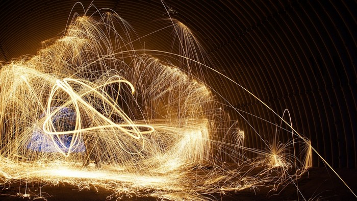 Abstract light painting with sparks and swirls