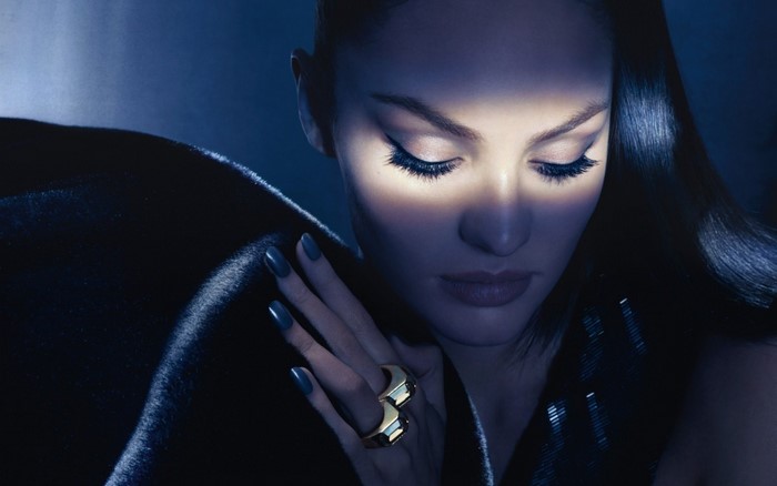 Candice Swanepoel with dark hair and makeup
