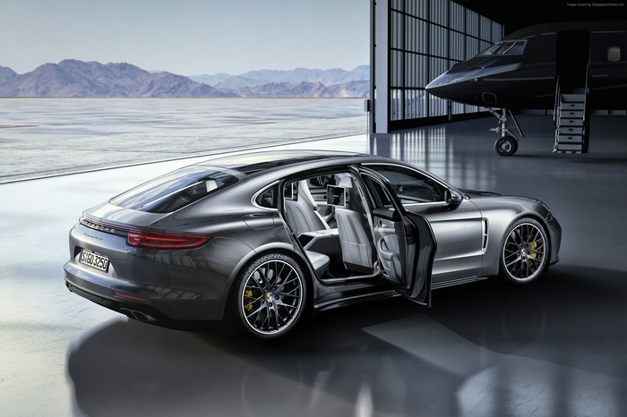 Silver Porsche Panamera Turbo with Private Jet