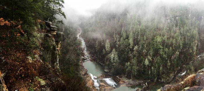 Tallulah Gorge with waterfall and misty forest