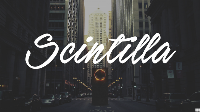 Scintilla text over a city street with a poster