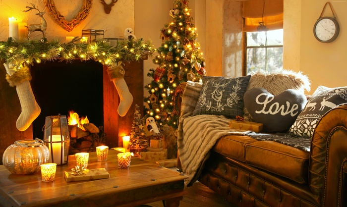 Cozy Christmas living room with fireplace and tree