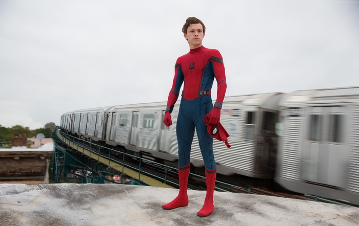 Spider-Man from Spider-Man: Homecoming on a train bridge