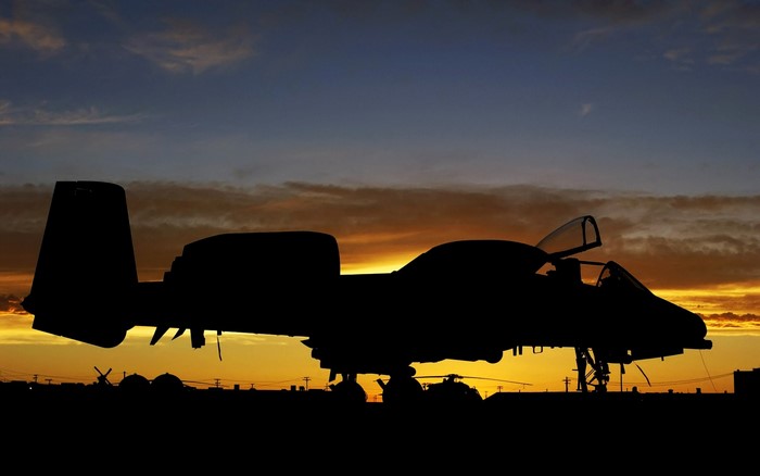 Silhouette of Fairchild A-10 Thunderbolt II aircraft at sunset
