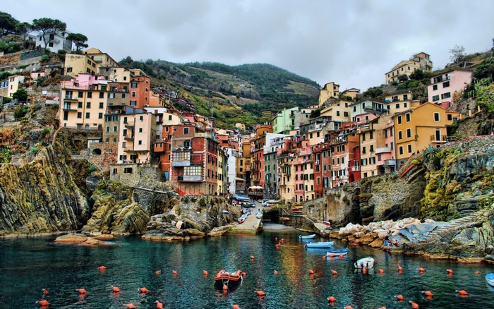Colorful Italian village on a rocky coast overlooking the sea