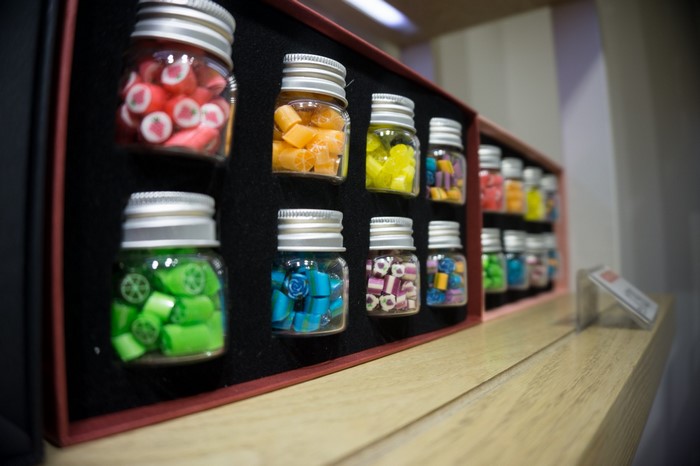 Jars of colorful hard candies on display