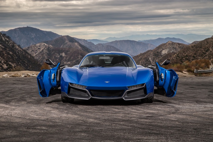 Blue Rezvani Beast Alpha supercar with doors open