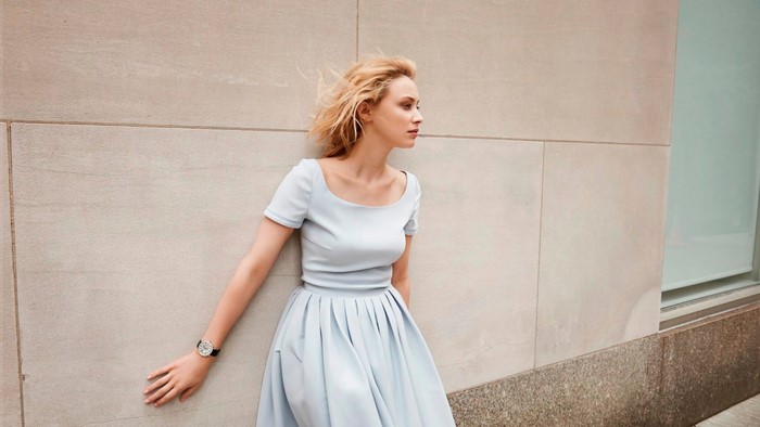 Sarah Gadon wearing a light blue dress