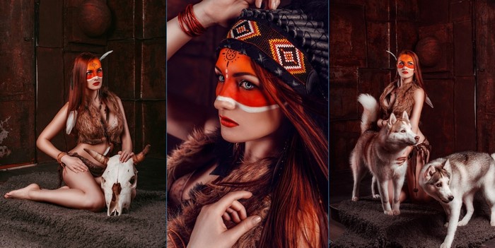 Woman in Native American Headdress with Dogs and Skull