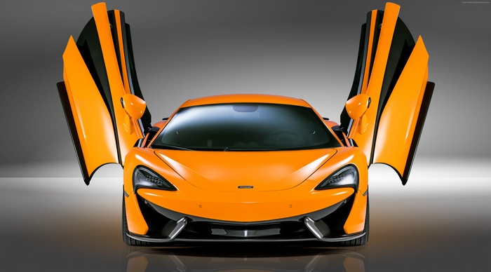 Orange McLaren 570S with doors open