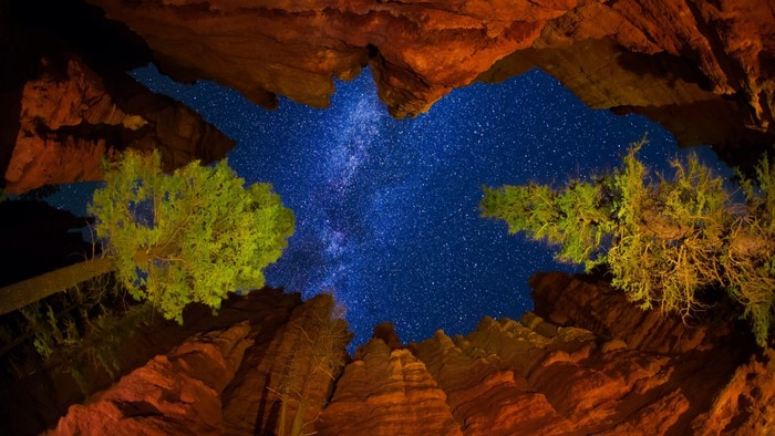 View of the Milky Way through a canyon in Utah