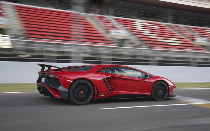 Red Lamborghini Aventador SV on a race track