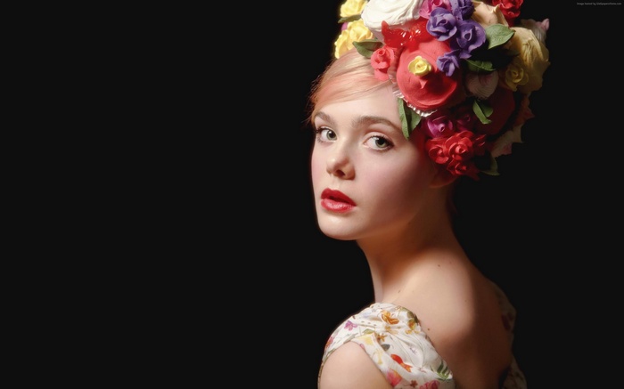 Elle Fanning wearing a floral headdress