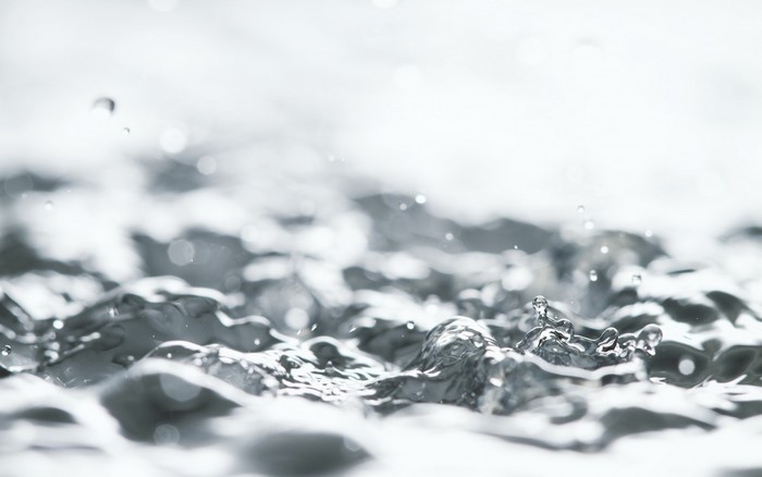 Close-up of water splashing and droplets