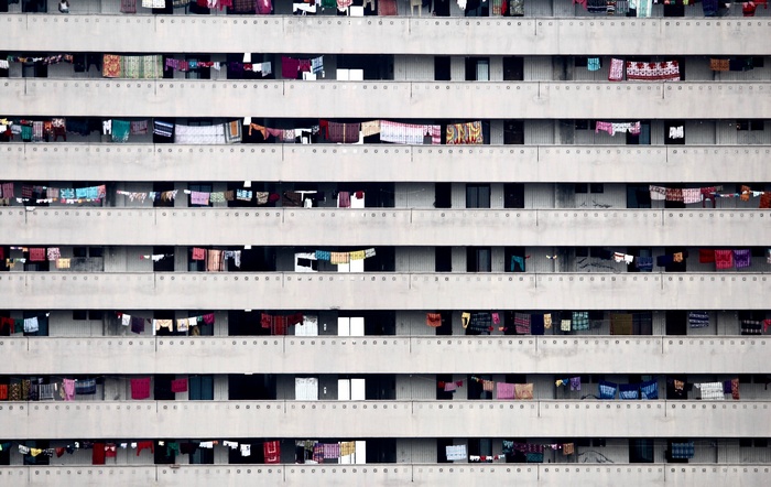 Apartment building with laundry hanging from balconies