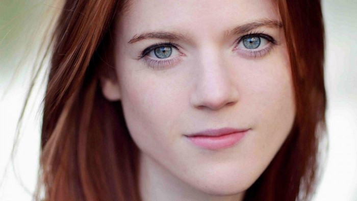 Rose Leslie portrait with red hair and blue eyes
