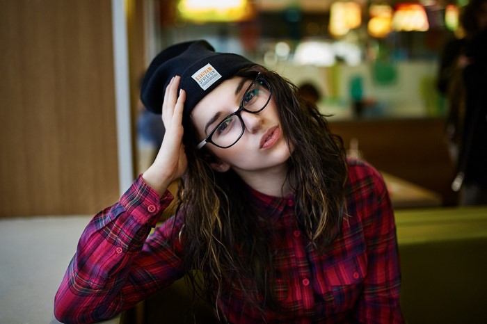 Portrait of Woman in Red Plaid Shirt and Glasses