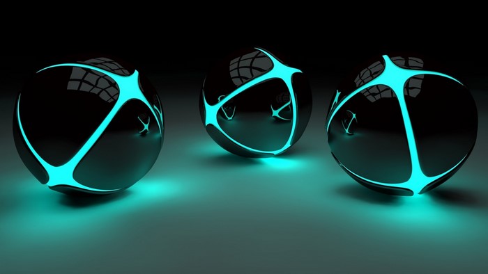 Three glowing black spheres with cyan light patterns