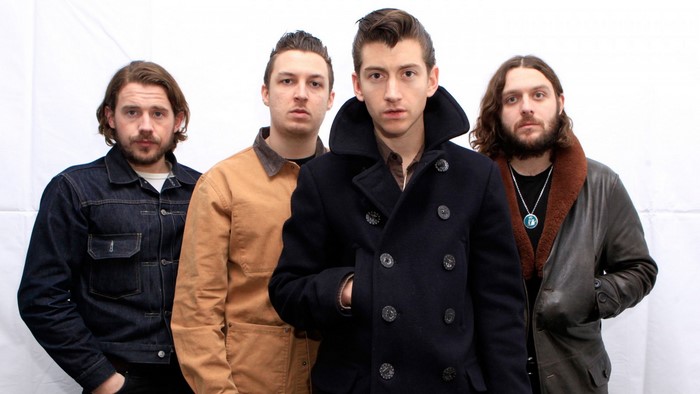 Arctic Monkeys band members posing