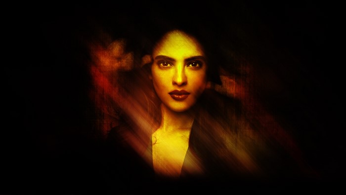 Woman with yellow and red lighting