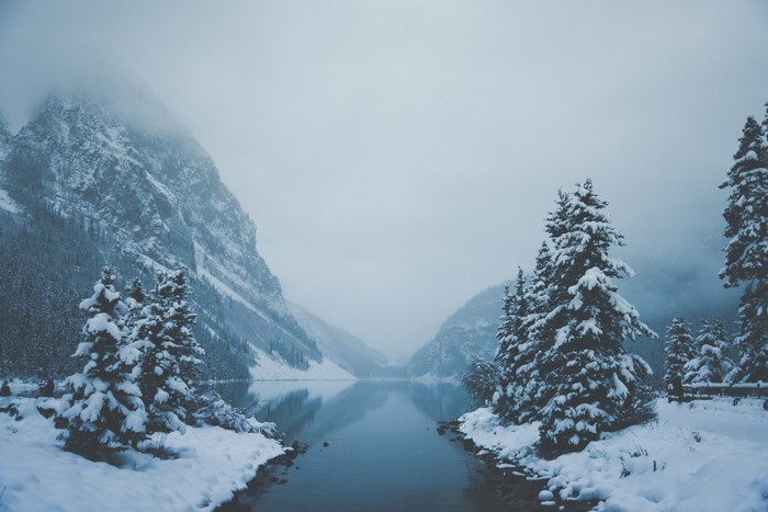 Snow-covered mountains and lake in winter